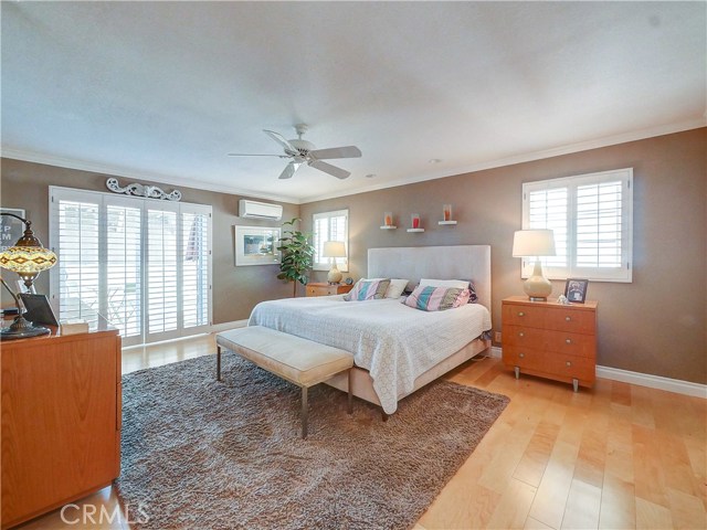 The master bedroom with sliding glass doors to the private patio.