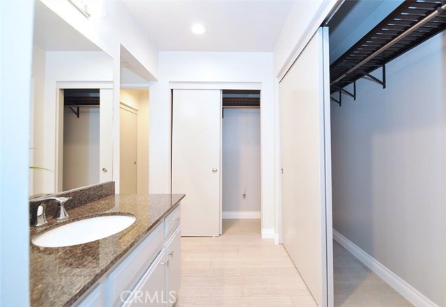 Another view of the Master dressing area and gorgeous granite vanity.