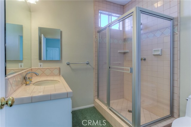 Upstairs bathroom located in bedroom