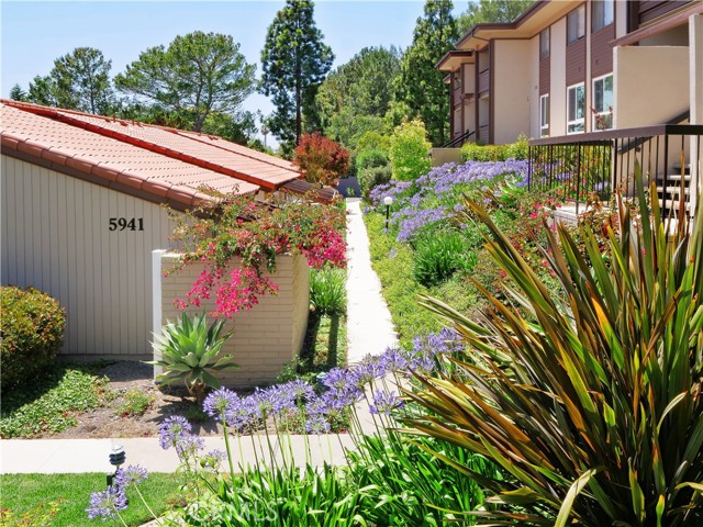 Building view surrounded by beautiful landscaping.
