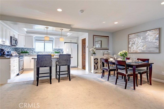 Large dining area capable of seating 6-8 people. Completely remodeled, stunning, kitchen. Breakfast bar/counter for quick bites. Main level powder room for guests. Large dining area capable of seating 6-8 people. Completely remodeled, stunning, kitchen. Breakfast bar/counter for quick bites. Main level powder room for guests.