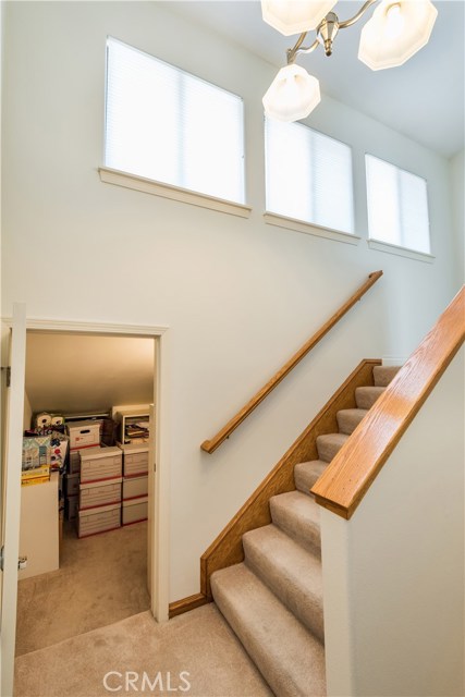 Stairway landing has storage room that could be used for crafts, playroom, etc...