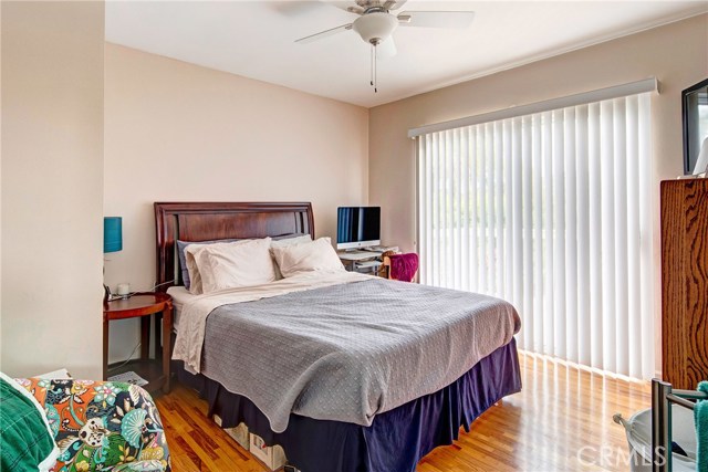 Bedroom #3 of the main house with tons of light and access to the large balcony overlooking the sparkling pool.