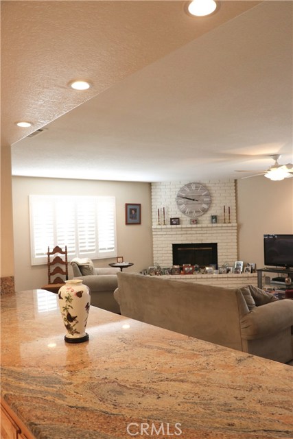 Kitchen open to living area with bar seating