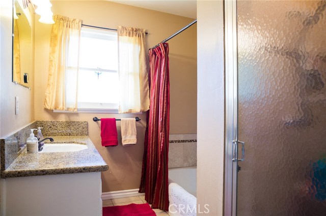 Main bathroom with soaking tub and stall shower