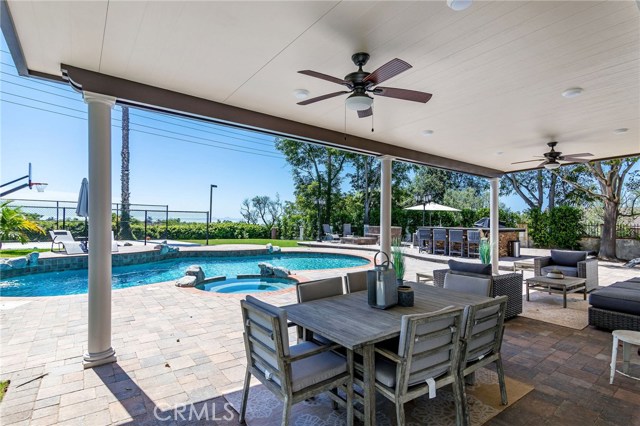 COVERED PATIO, PERFECT FOR AL FRESCO DINING. LOOK OUT ON TO OCEAN VIEWS WHILE YOU DINE.