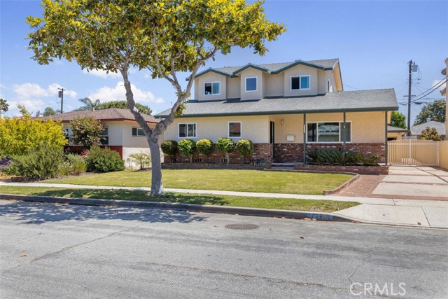 Stunning paved driveway leading to back yard