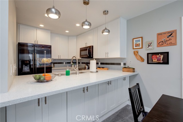 Additional storage under extended countertop.