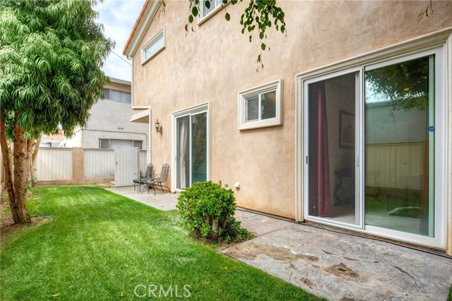 Large, private and grassy landscaped backyard exclusive to rear unit.