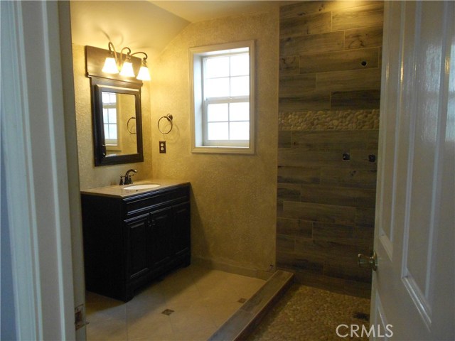 Master Bath almost done. Brand New Large walk in shower....almost done. Transformed.