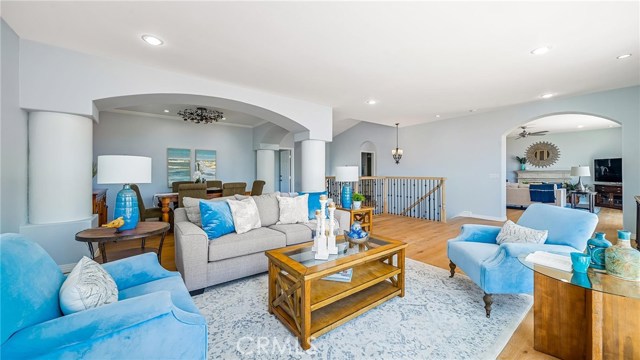 Living room and dining room from SW corner.  Family room n the background to the right.