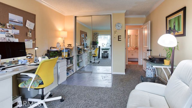 2nd Bedroom is spacious and currently being used as an office...also has a sliding glass door to the balcony