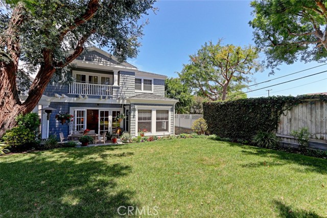 Sunny south facing grassy backyard.