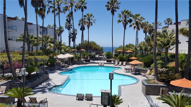 Resort Style Ocean Club Pool with Cabanas and Sundeck