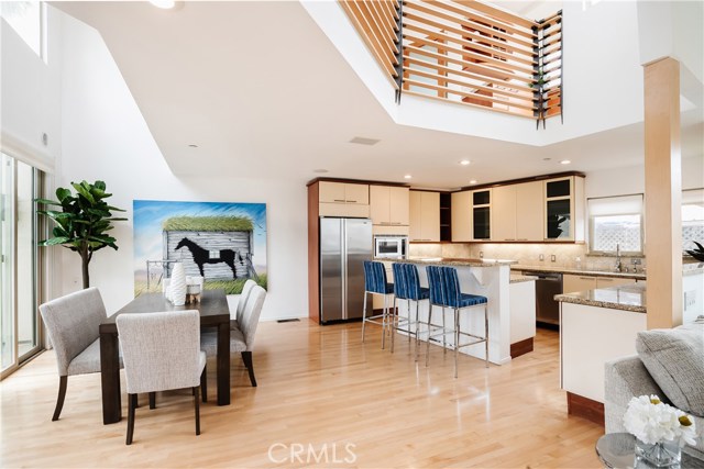 Open Floor Plan; Dining Area into Kitchen with Loft/3rd Bedroom above