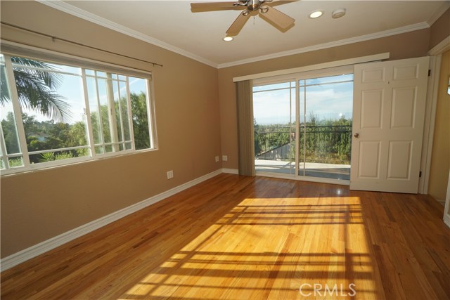 Upstairs bedroom with ensuite and city lights view.