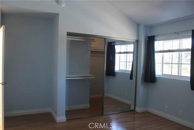 Master bedroom with spacious walk in closet and cathedral ceilings !
