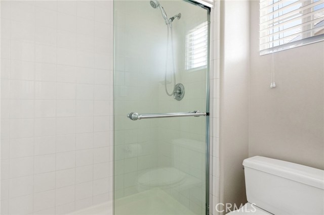 Step-in full size shower in the primary suite. [upstairs]