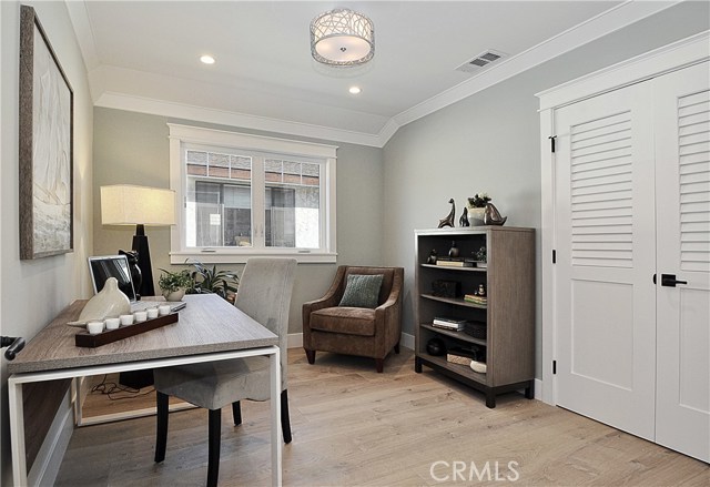 One of the 3 bedrooms in front house is staged as a home office