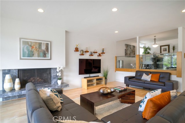 Living room flows to dining room above.  Great for dinner parties.