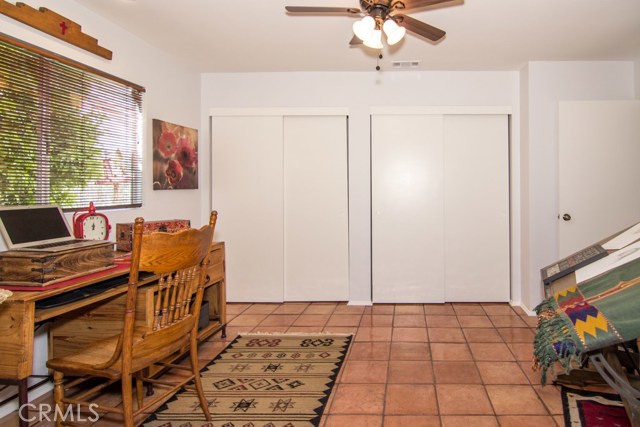 OFFICE WITH PLENTY OF CLOSET STORAGE.