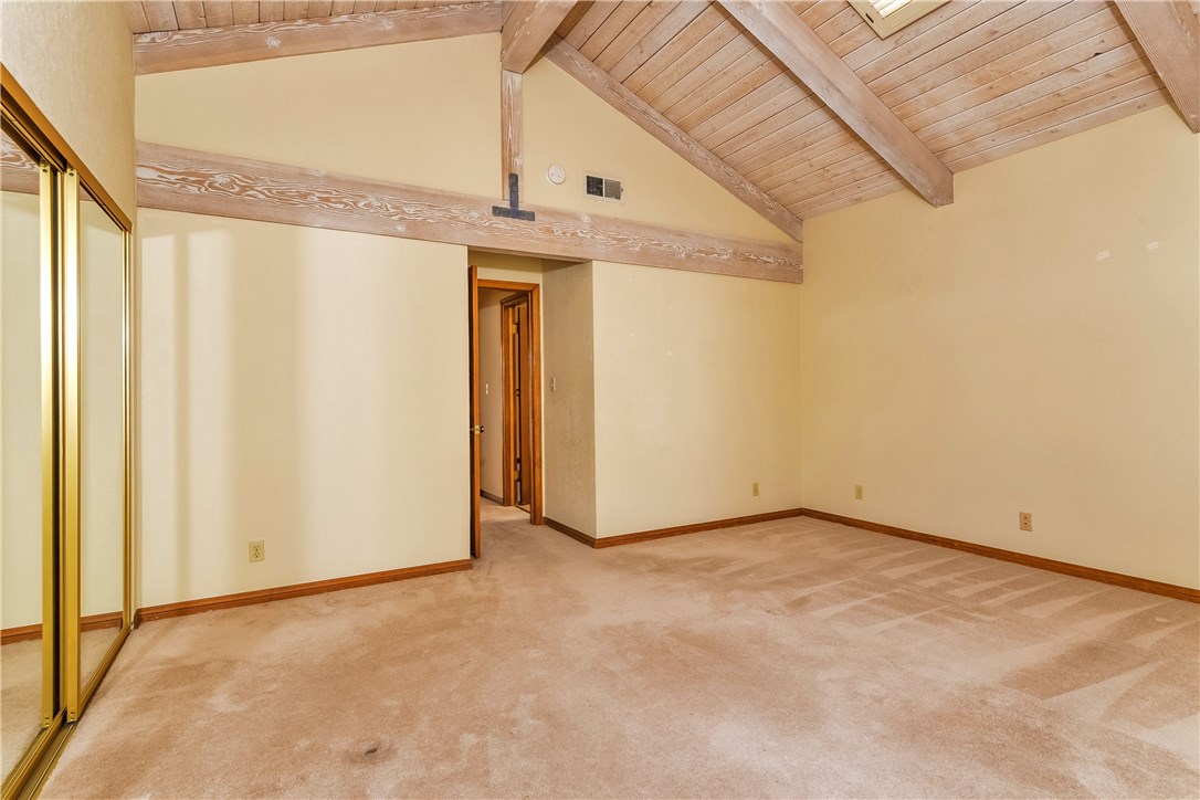 The rear master bedroom is very large and the open vaulted ceiling enhance the open spaciousness.