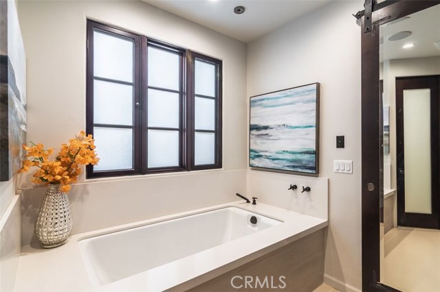 Deep soaking tub in master bath