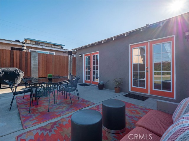 Patio view from opposite corner, custom painted doors add a pop of color!