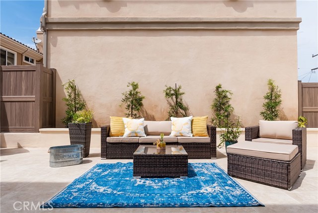 The spacious backyard is located just off the living and dining areas.