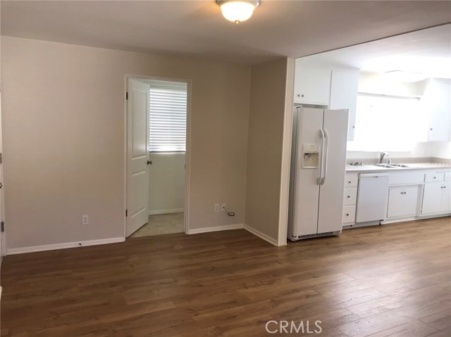 Separate laundry room off of family room and kitchen