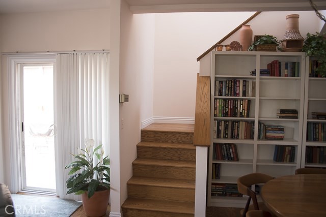 View of sliding door to patio area and stairway to 2nd level.