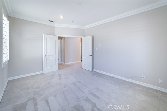 This is the 5th bedroom but without closet on the second level off the living room.