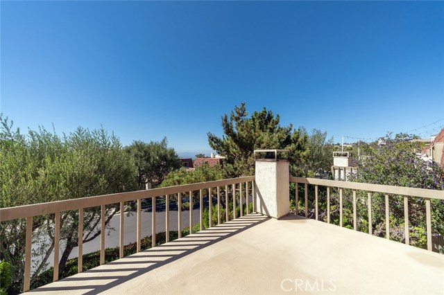 Large West facing deck with mountain and ocean view