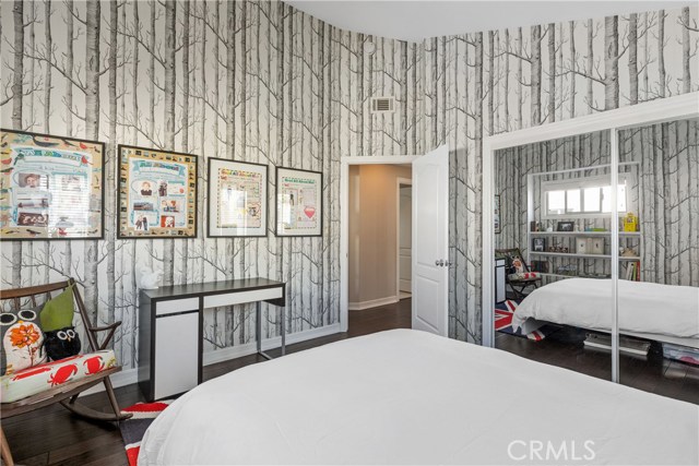 Mirrored closet doors.  Closet is designed by CA Closets.  Vaulted ceilings!!!