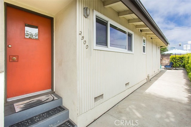 Front door and walk-way to backyard.