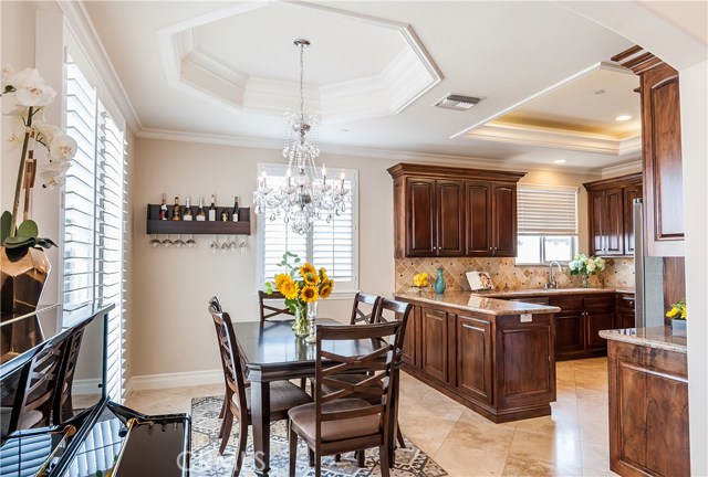 The dining area, located just off the living area, features this stunning chandelier.