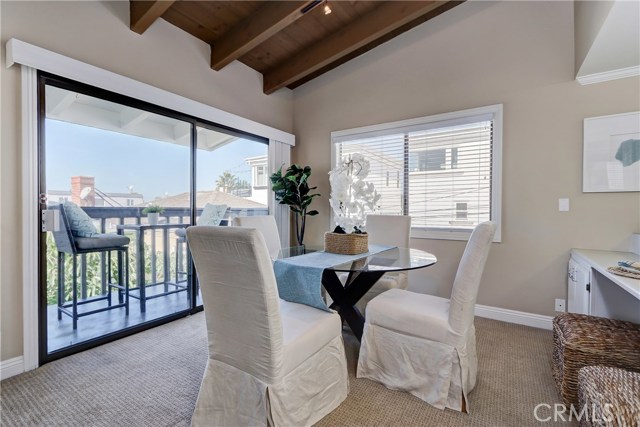 Loads of entertaining room with a dining area, outdoor deck and kitchen bar area!