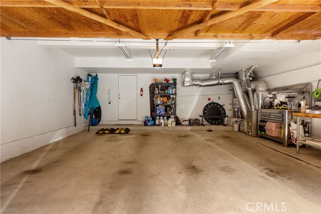 Over size two-car garage w new water heater and furnace