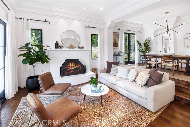 Living room off entry. Connects directly to the formal dining room.