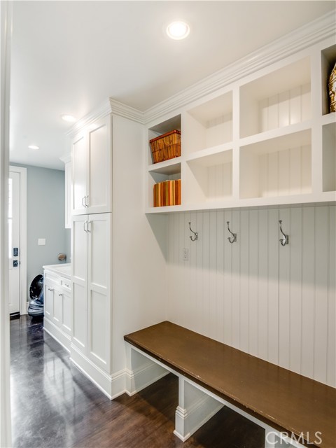 Downstairs mud room with exterior door for easy access to back yard and spa.