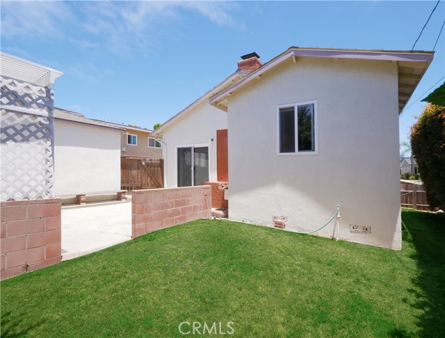 Backyard adjacent to patio