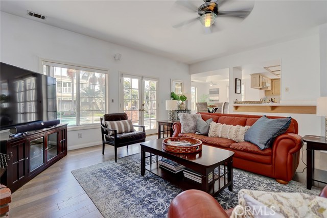 Family Room Area with Bar Countertop and View to Backyard and Breakfast Nook