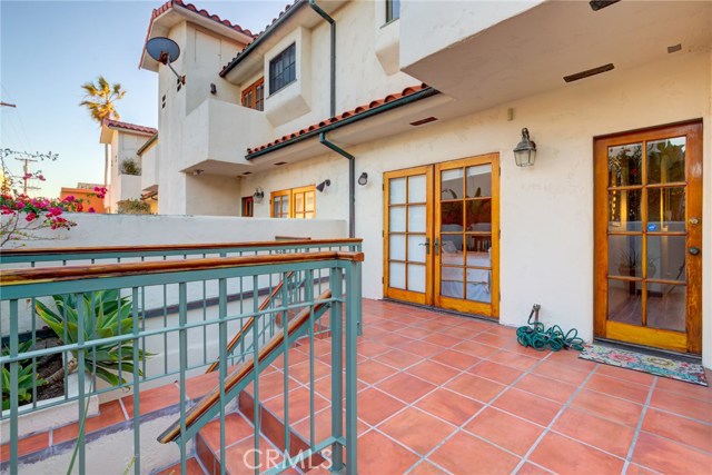 Large private patio for secondary bedroom catches beautiful morning sunlight.