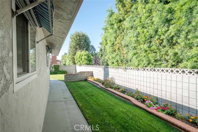 Southwest facing backyard. This picture is taken standing just outside the front entry. The awnings also provide afternoon shade and are retractable.