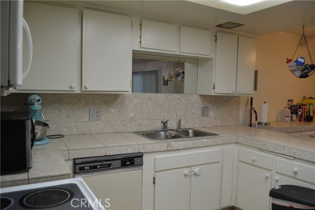 Kitchen from opposite side entryway.