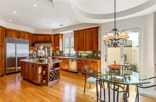 Oversized island with prep sink and 2nd dishwasher.