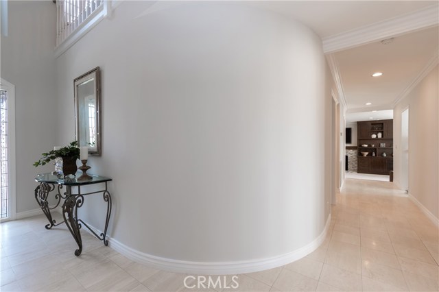 This is the nice curved wall by the entry.  Family room can be seen at the end of the hallway.