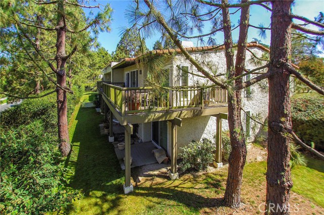 This coveted end-unit is shaded by mature trees that still allow plenty of natural light. This unit feels more like a single family home than a town home.