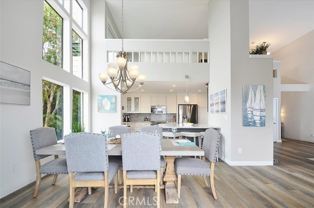 Another view of the dining room, kitchen and the loft (which can easily be converted to  a 3rd bedroom)