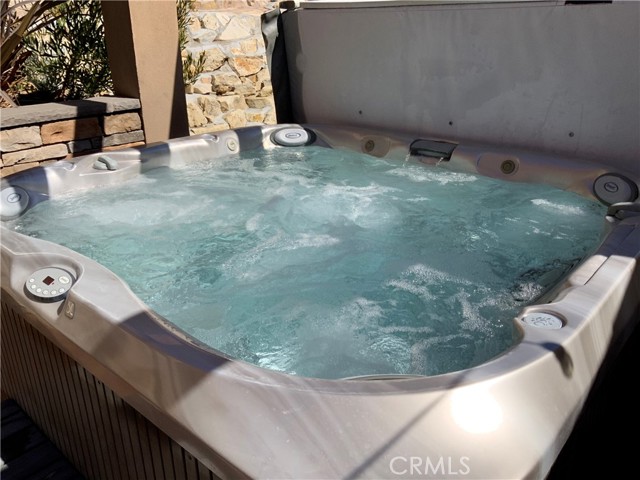 Jacuzzi comes with home without warranty. I love that it is right outside the master and it is perfect to jump into after a hard workout class.